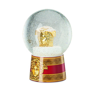 Versace meets Rosenthal Medusa Amplified Golden Coin glass sphere with snow effect h. 16.8 cm. Buy on Shopdecor VERSACE HOME collections