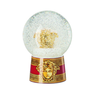 Versace meets Rosenthal Medusa Amplified Golden Coin glass sphere with snow effect h. 16.8 cm. Buy on Shopdecor VERSACE HOME collections